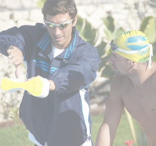 Swimming Coach discussing performance with athlete swimmer