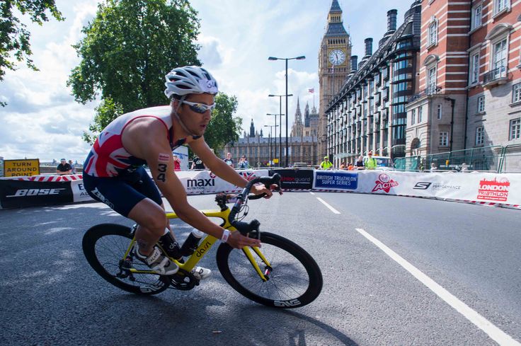 Athlete cyclist taking part in a race in london