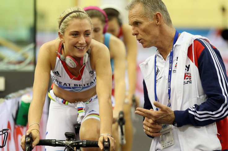 Cyclist coach giving verbal support to athlete cyclist