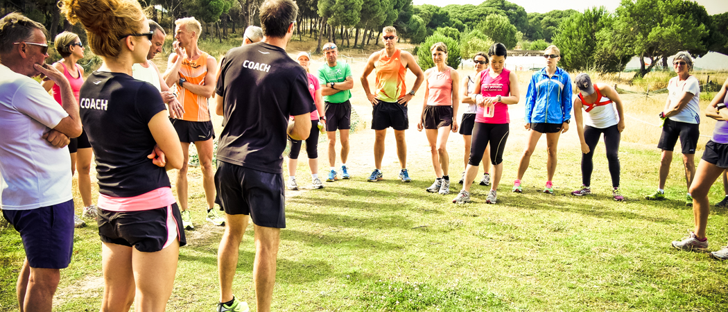 Group of amateur runners get ready for training session.